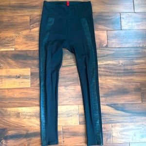 Like-new Spanx Black leggings with faux leather crocodile paneling on sides